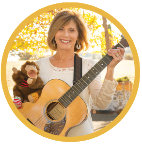 Joni DeGabriele (Mrs. D) of Musical Moments - With sidekick Spunky the Monkey Joni DeGabriele of Musical Moments with puppet Spunky the Monkey